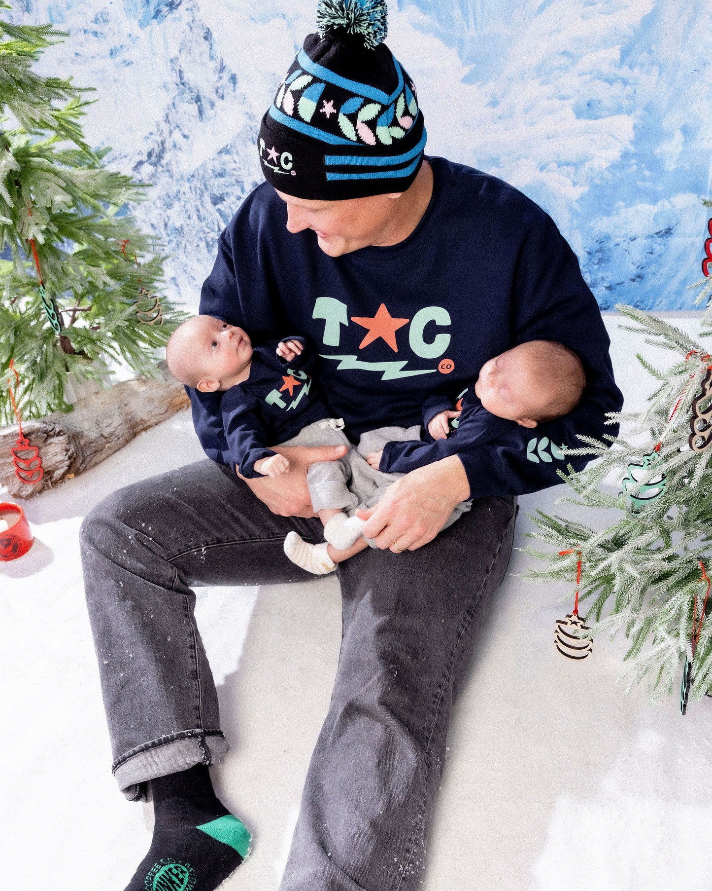 
                  
                    man with babies in tinker gear
                  
                