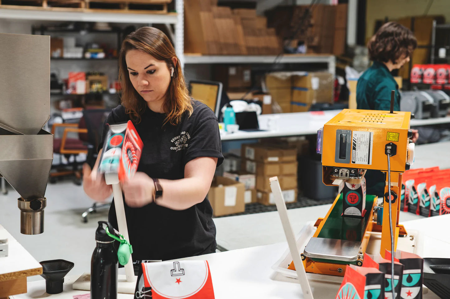 woman packaging coffee